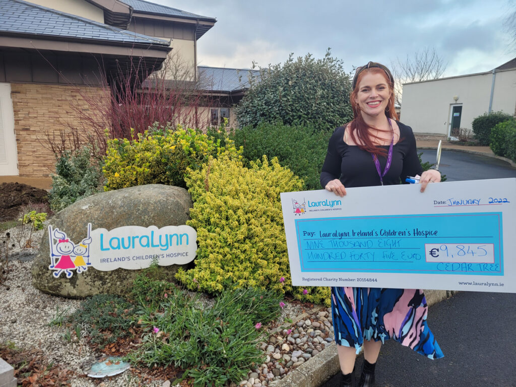 Niamh Doyle of LauraLynn Children's Hospice with the 2021 donation from all of Cedar Tree's customers.​